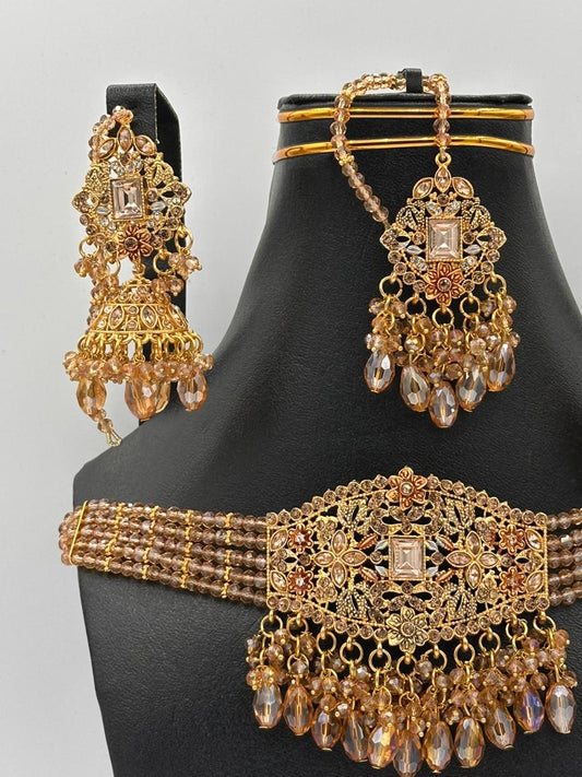 Antique Gold Floral Choker Set with Crystal Jhumkas & Statement Tikka