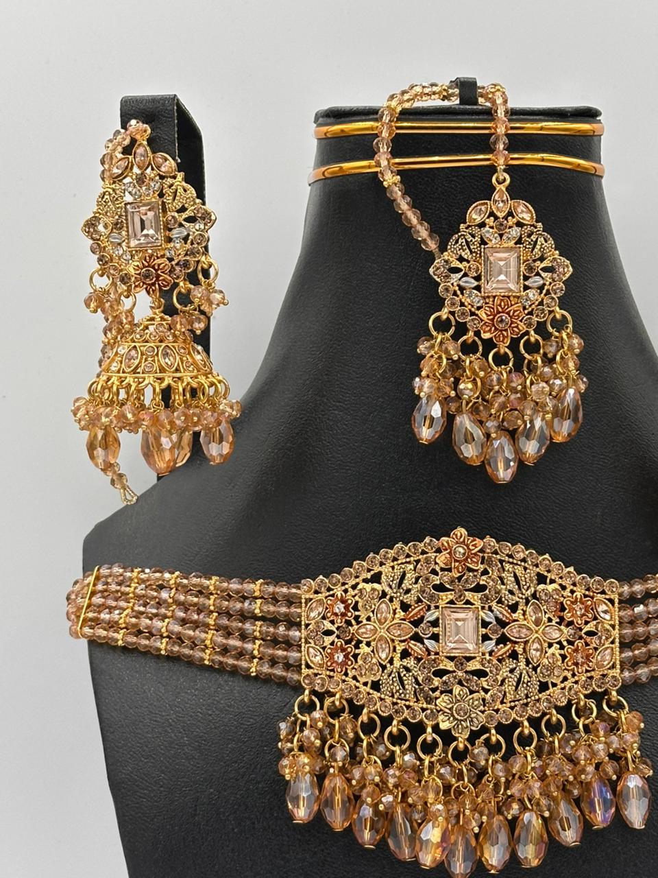Antique Gold Floral Choker Set with Crystal Jhumkas & Statement Tikka