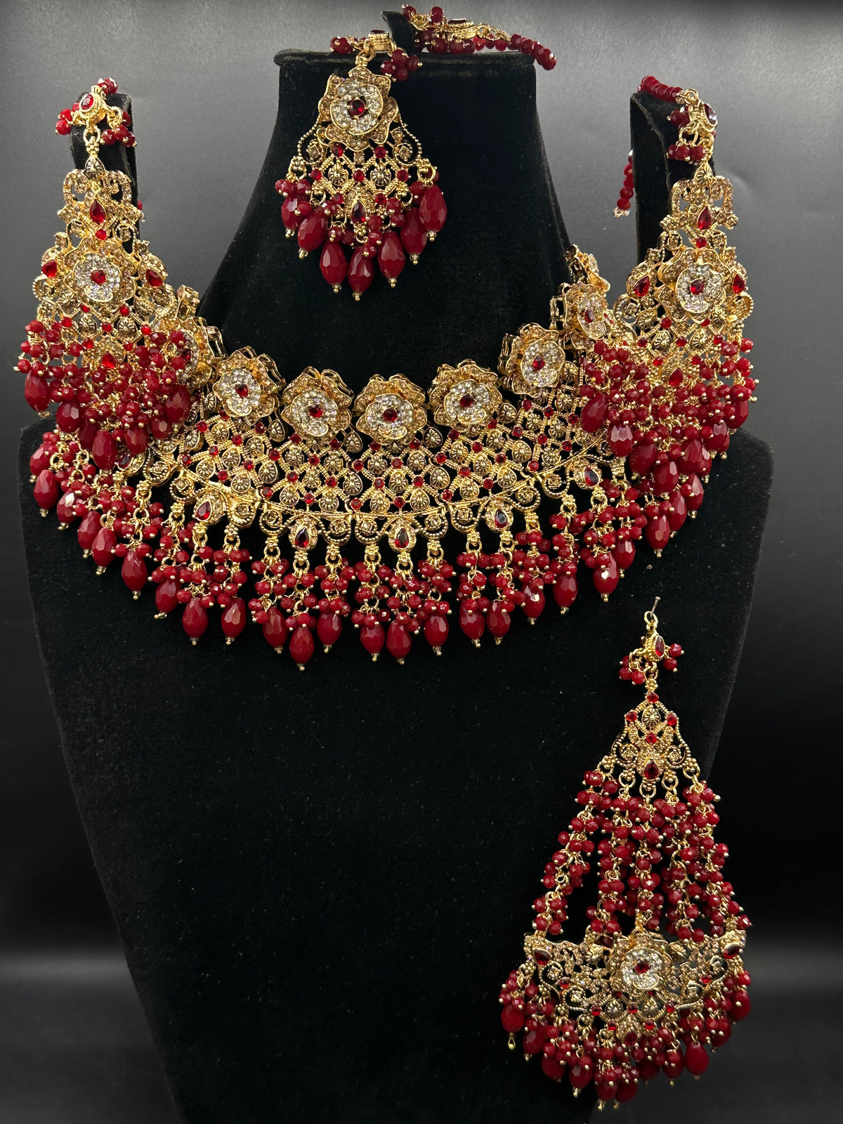 Mehroon zarkoon bridal set with necklace, matching earrings and tikka