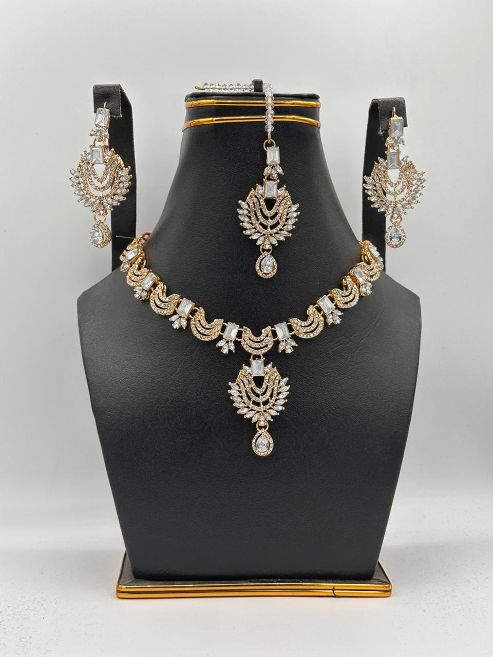 Timeless Kundan-Style Gold Choker Set with Floral Maang Tikka